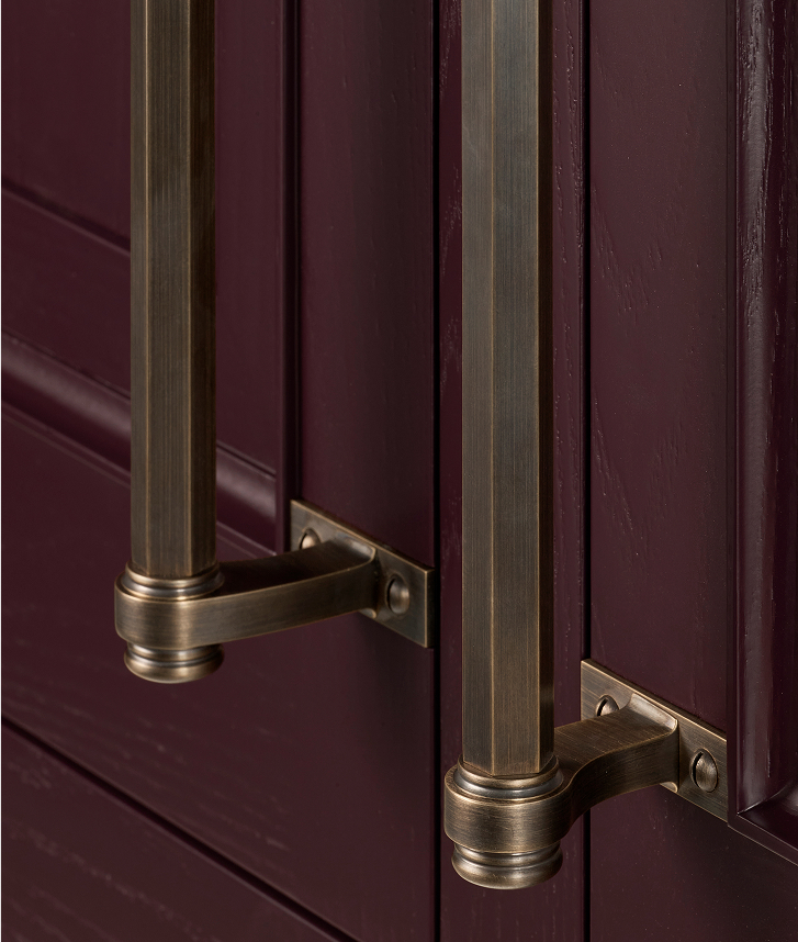 Solid brass pulls lend instant architecture to a room without overpowering it.