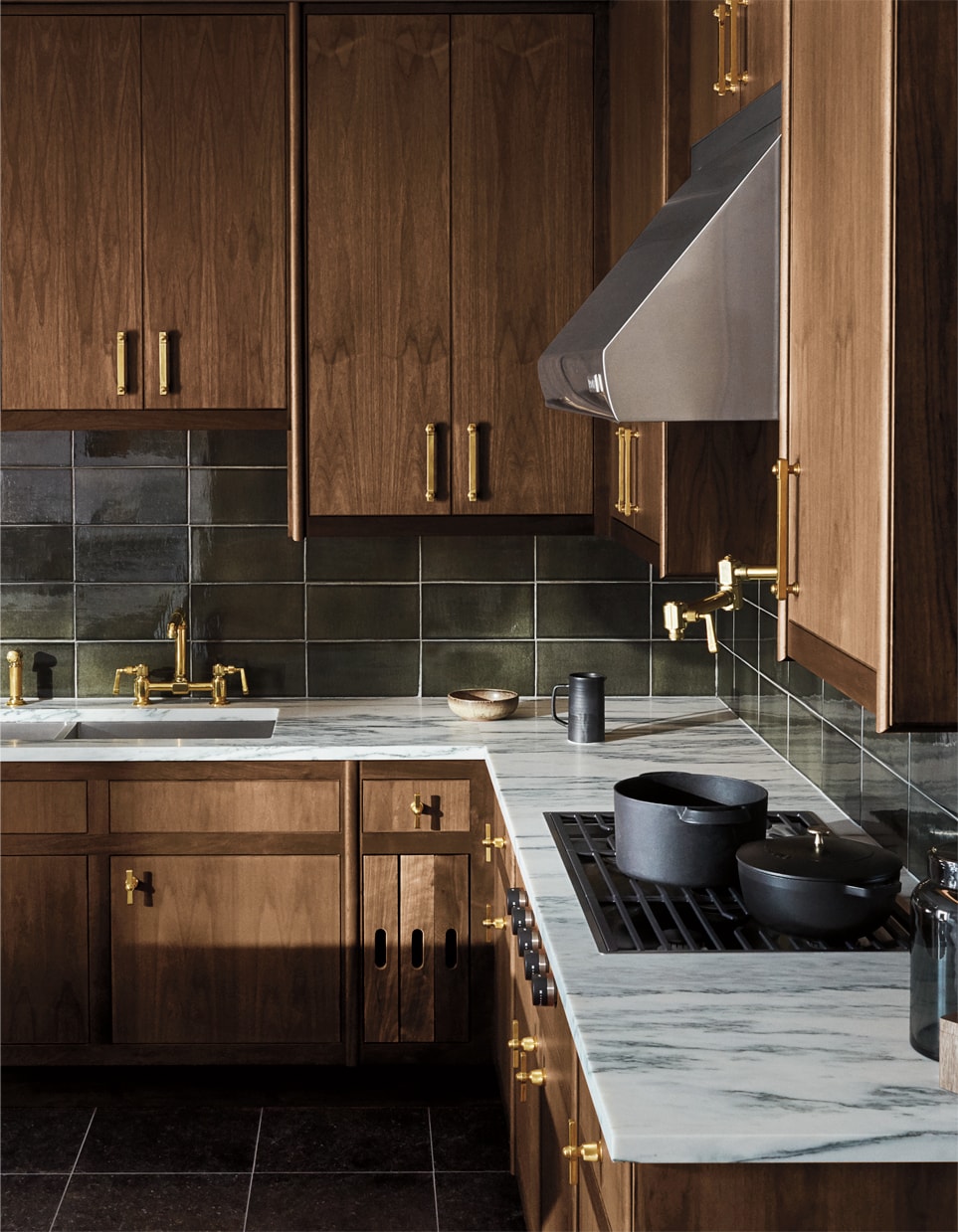 ALTA CABINETRY IN ANTIUE WALNUT, R.W. ALTAS PULLS IN UNLACQUERED BRASS, R.W. ATLAS FAUCET IN UNLACQUERED BRASS, R.W. ATLAS POT FILLER UNLACQUERED BRASS, KERR TRIPLE STAINLESS STEEL SINK AND ARCHITECTONICS BACKSPLASH IN SHAGREEN