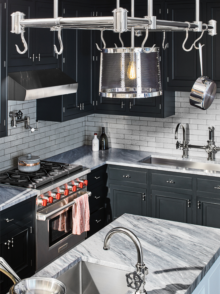 BELDEN CABINETRY IN MIDNIGHT, BELDEN ISLAND CABINETRY, CUSHING PULLS IN NICKEL, REGULATOR FAUCET IN NICKEL , REGULATOR POT FILLER IN NICKEL, KERR STAINLESS STEEL SINKS, IPSWICH PENANT IN NICKE AND METROPOLE POT RACK IN NICKEL